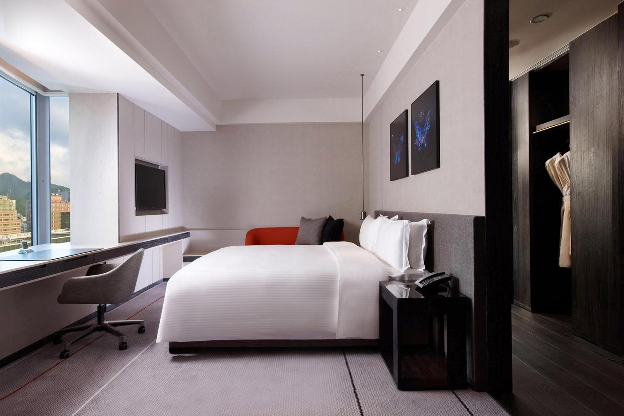 Отель Humble House Taipei, Curio Collection By Hilton Экстерьер фото A room at the hotel